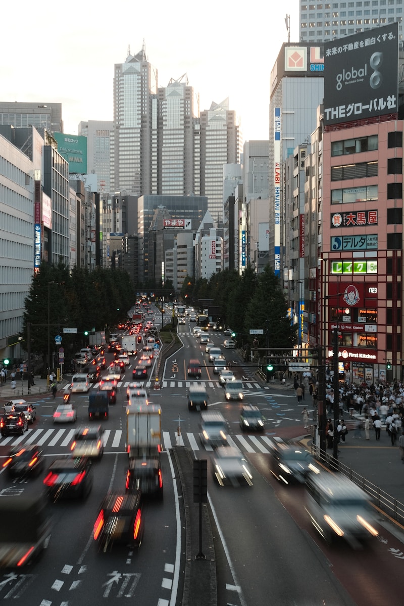 A busy city street filled with lots of traffic